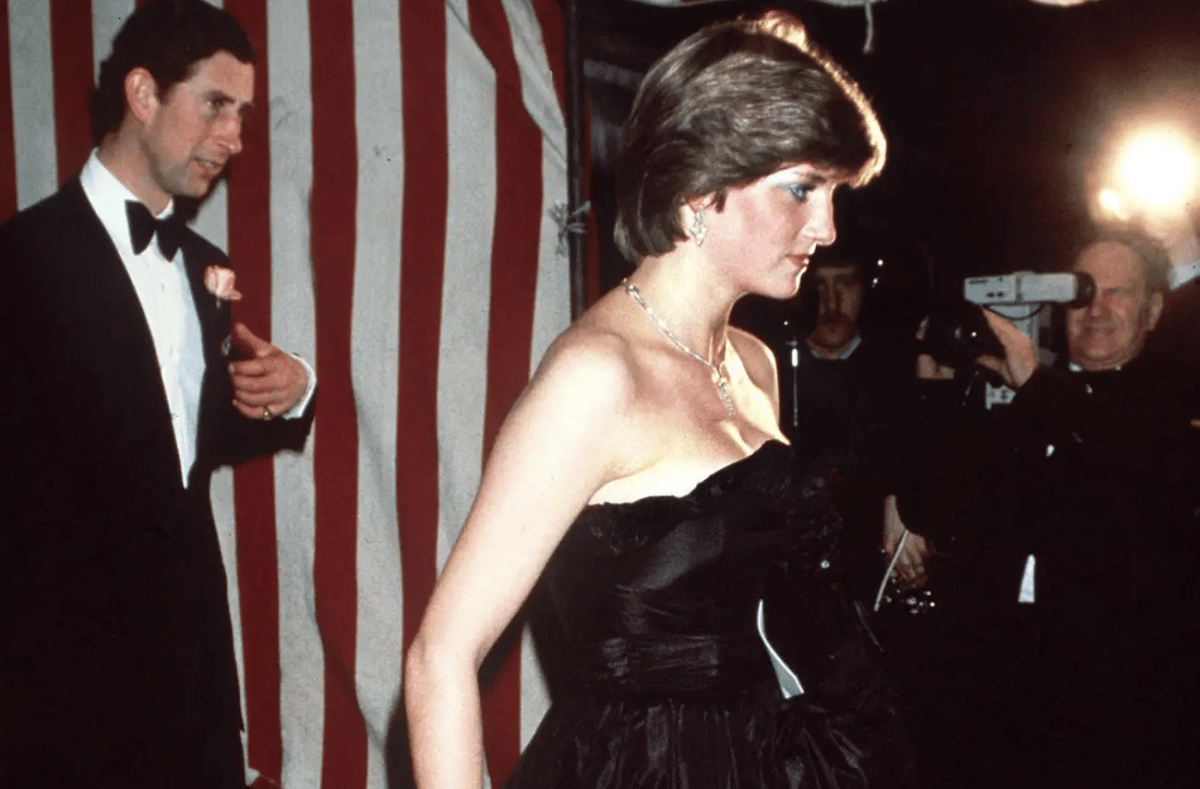 Princess Diana wearing a black dress to her first royal engagement