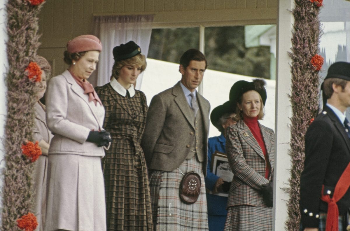 The Queen Mother (far left), Queen Elizabeth II, Diana, Princess of Wales and Prince Charles at the Braemar Highland Games in Scotland, September 1982. Diana is wearing a suit by Caroline Charles