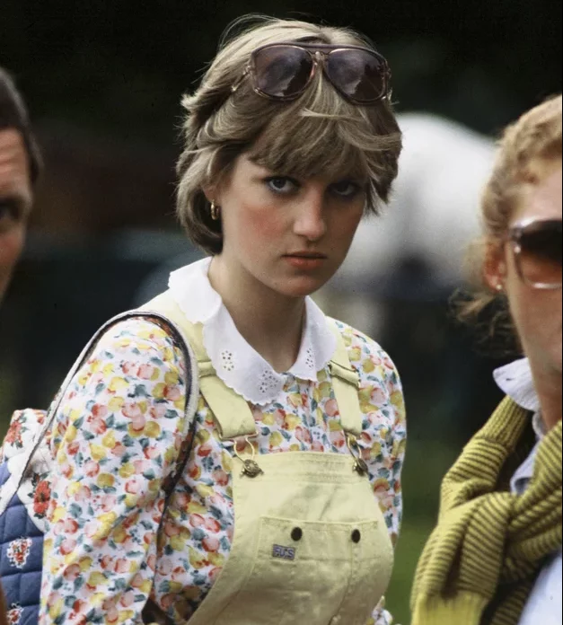Princess Diana sported a floral shirt and yellow overalls while attending a polo match in July 1981.