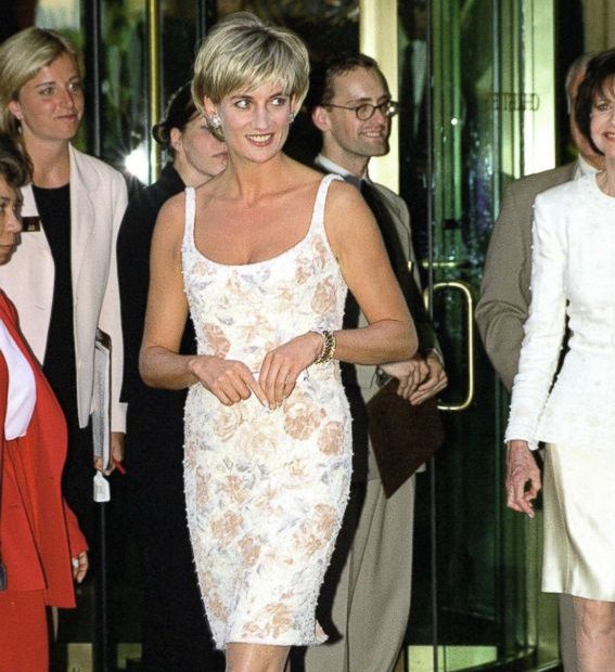 Diana, Princess Of Wales arrives for the Christie's party in New York wearing a champagne colored dress designed by fashion designer Catherine Walker, June 23, 1997.